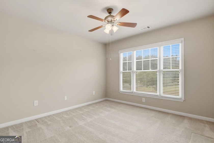 You will love this 6-bedroom home with the primary suite on the - photo 31