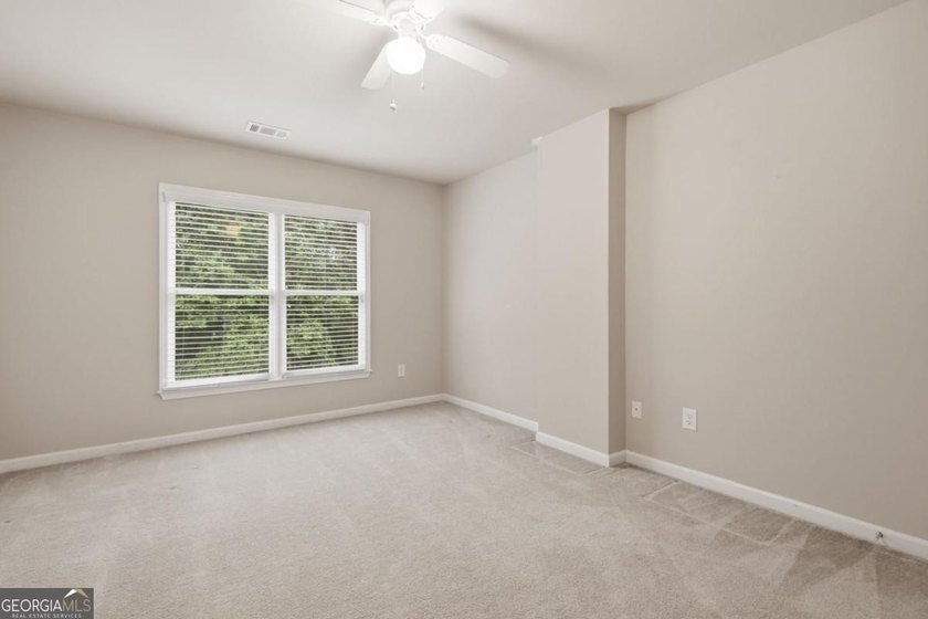 You will love this 6-bedroom home with the primary suite on the - photo 42