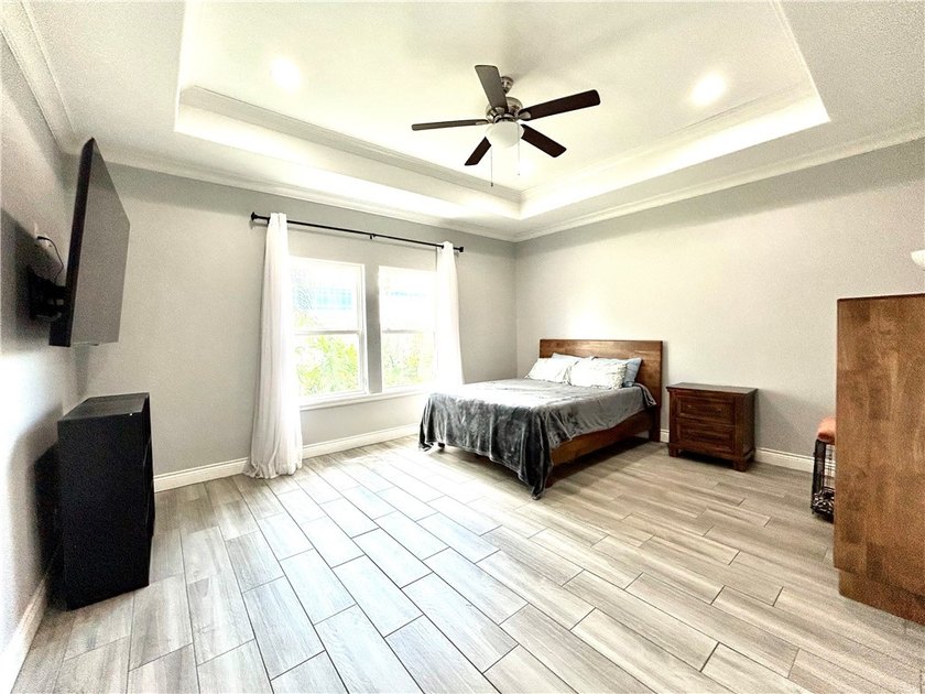 Nestled back in a private, gated community, this well taken care - photo 13