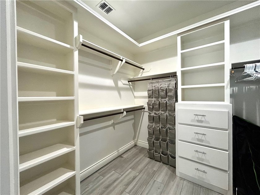 Nestled back in a private, gated community, this well taken care - photo 18