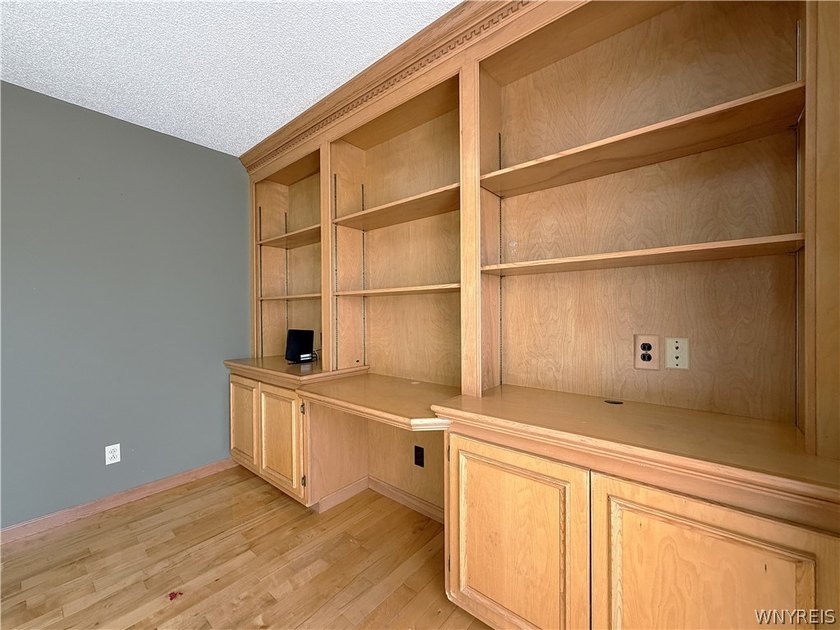 Located in a desirable neighborhood, this spacious home offers a - photo 13
