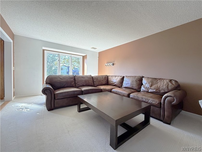 Located in a desirable neighborhood, this spacious home offers a - photo 15