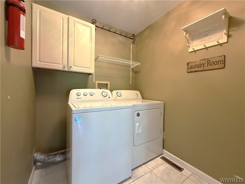 Located in a desirable neighborhood, this spacious home offers a - photo 18