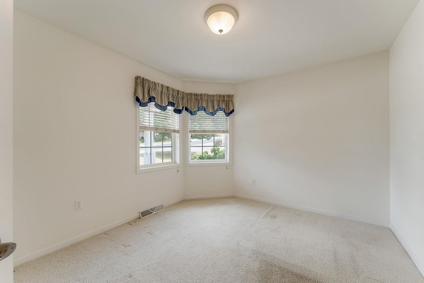 Priced below assessed value! Welcome to this well-maintained - photo 25