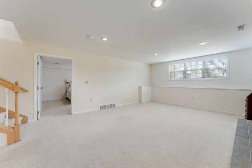 Priced below assessed value! Welcome to this well-maintained - photo 38