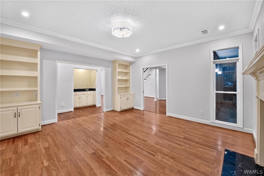 Nestled on a wooded golf course lot in the sought-after - photo 18