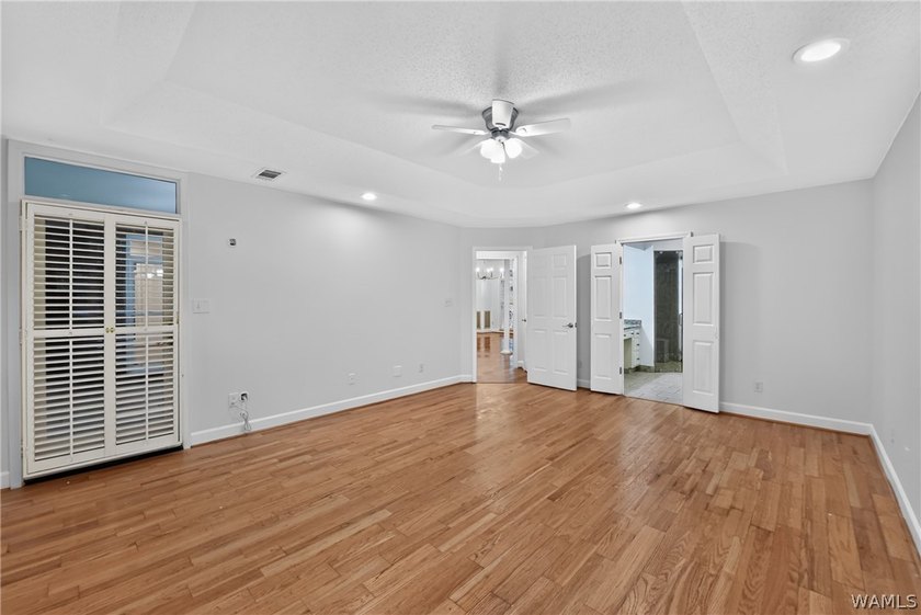 Nestled on a wooded golf course lot in the sought-after - photo 30