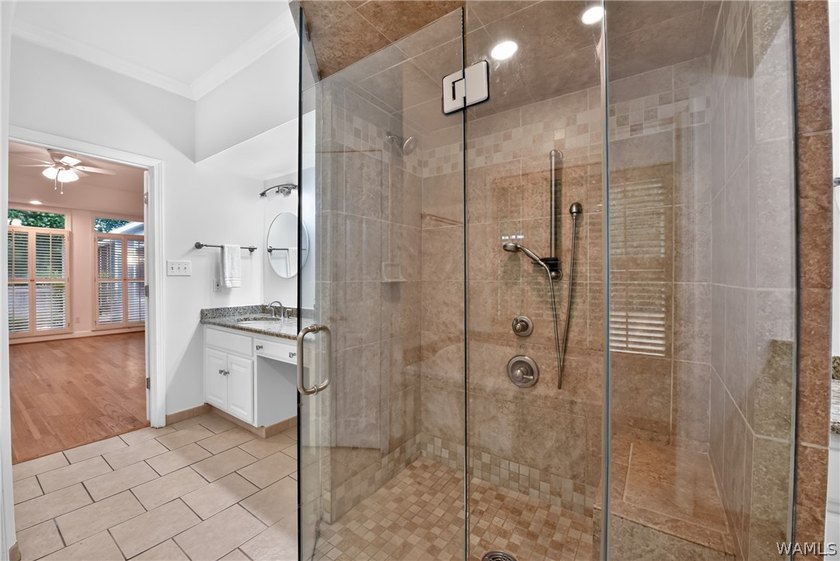 Nestled on a wooded golf course lot in the sought-after - photo 34