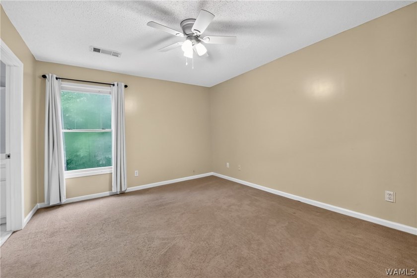 Nestled on a wooded golf course lot in the sought-after - photo 37
