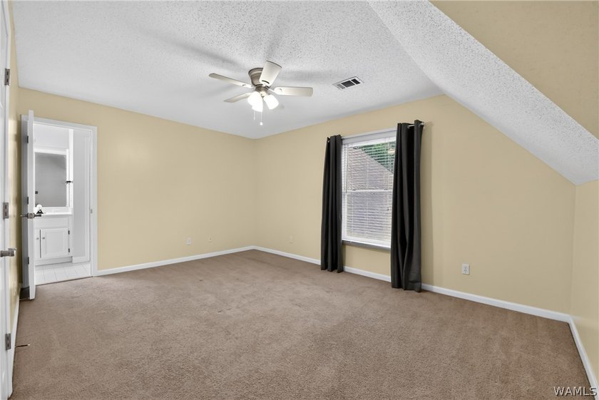 Nestled on a wooded golf course lot in the sought-after - photo 40