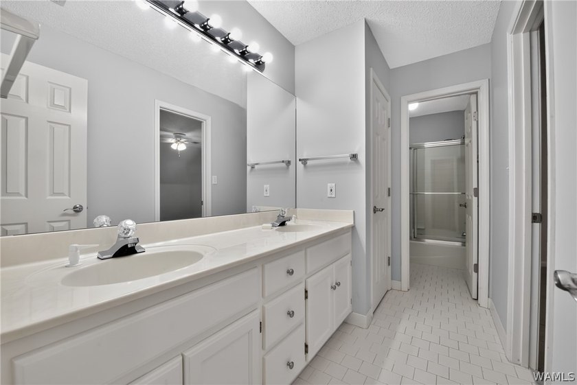 Nestled on a wooded golf course lot in the sought-after - photo 42