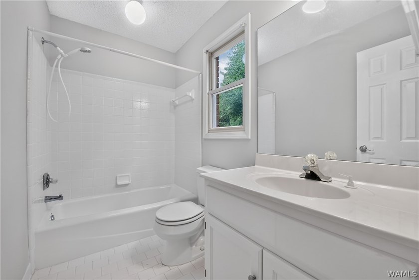Nestled on a wooded golf course lot in the sought-after - photo 43