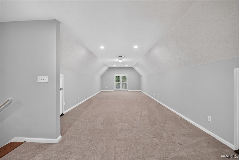 Nestled on a wooded golf course lot in the sought-after - photo 44