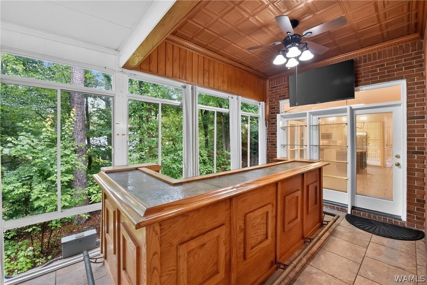 Nestled on a wooded golf course lot in the sought-after - photo 49