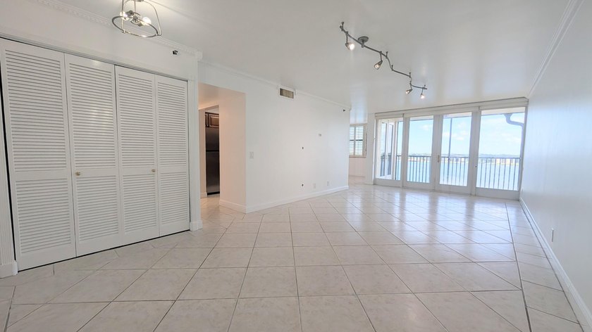 Enjoy beautiful lake views from this bright and inviting - photo 11