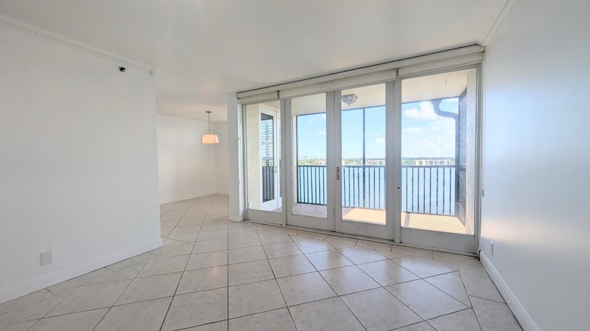 Enjoy beautiful lake views from this bright and inviting - photo 13