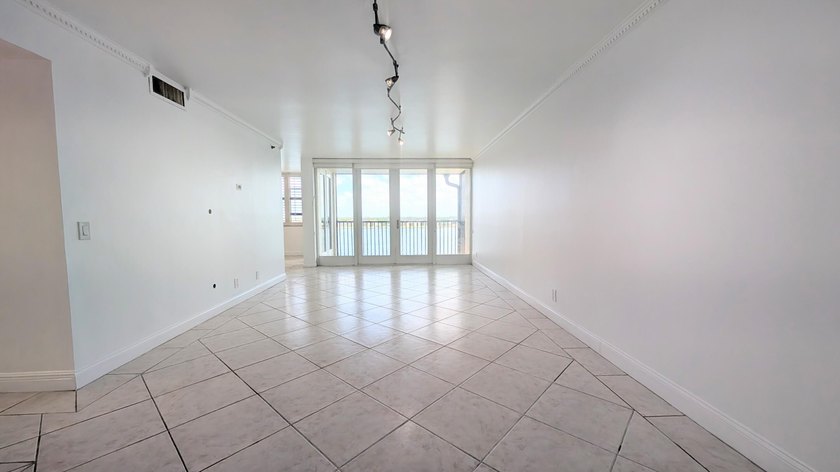Enjoy beautiful lake views from this bright and inviting - photo 14