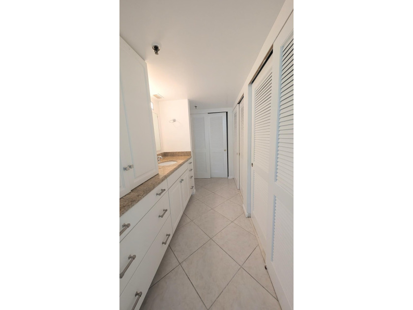 Enjoy beautiful lake views from this bright and inviting - photo 17