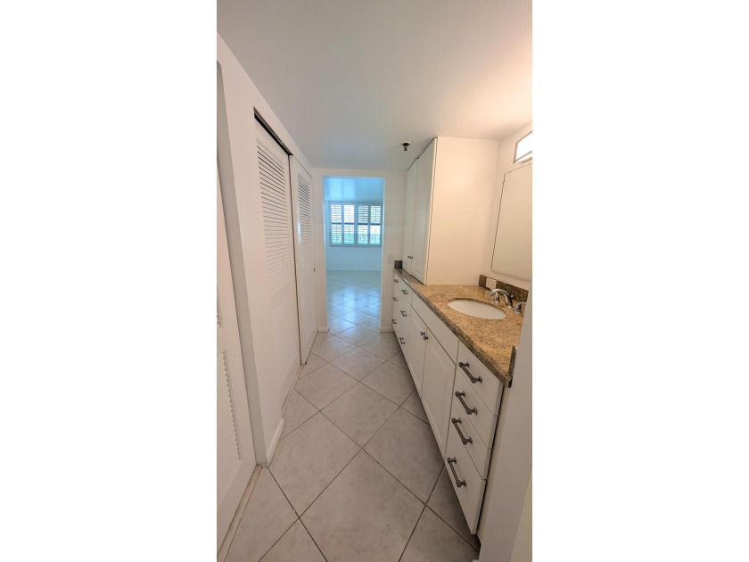 Enjoy beautiful lake views from this bright and inviting - photo 18