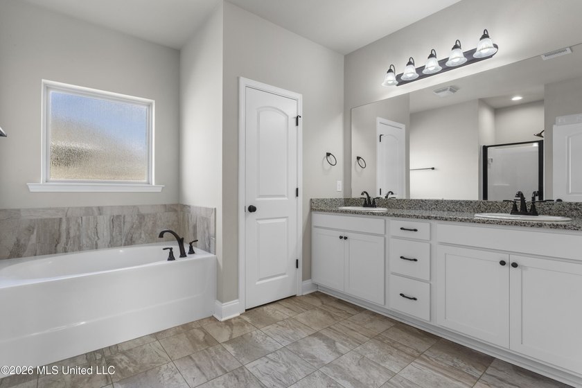 Don't miss this beautifully maintained home in the Savoy Place - photo 18