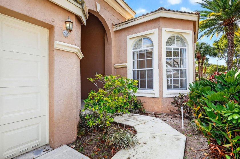Welcome home to Madison Green! This 3-bedroom, 2-bath home is - photo 3