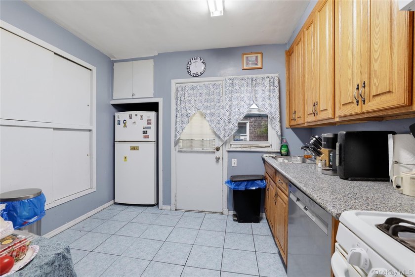 Charming brick home in tree-lined Oakland Gardens. This - photo 13