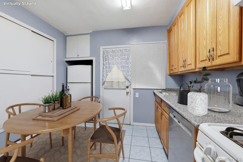 Charming brick home in tree-lined Oakland Gardens. This - photo 14
