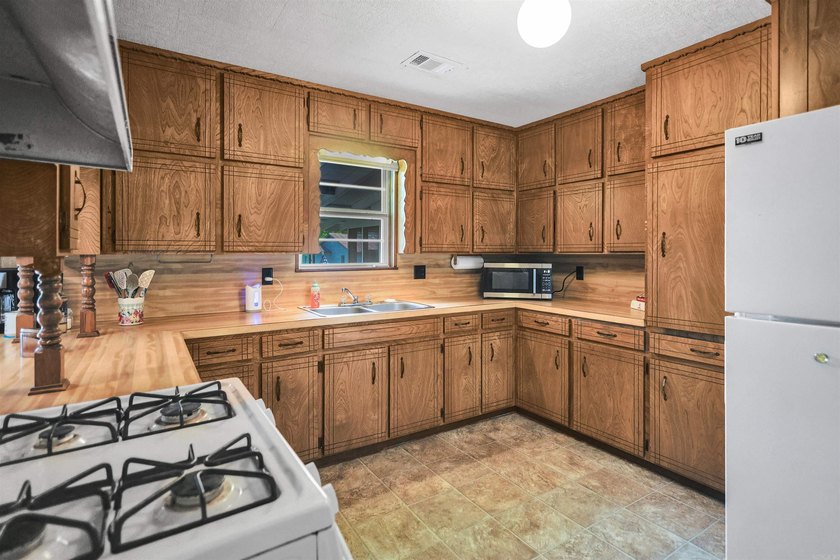 Classic brick home with room to spread out! Situated on - photo 12