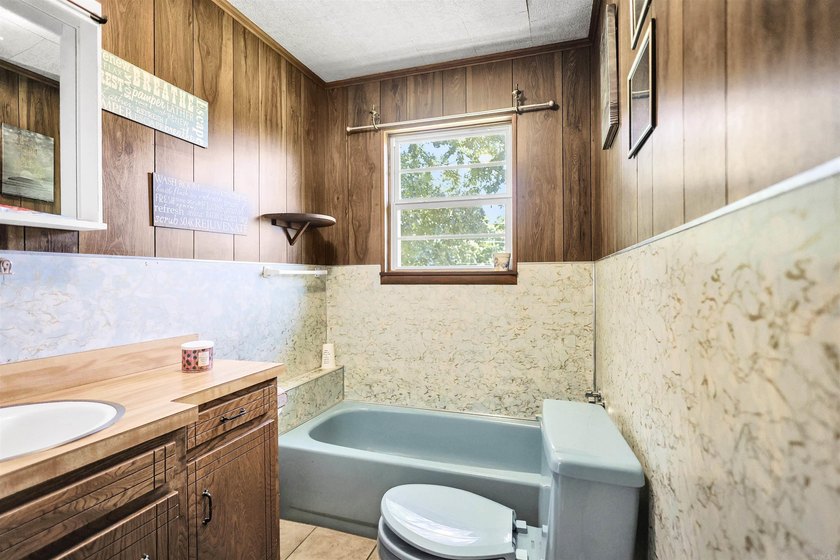 Classic brick home with room to spread out! Situated on - photo 23