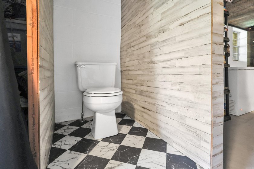 Classic brick home with room to spread out! Situated on - photo 27
