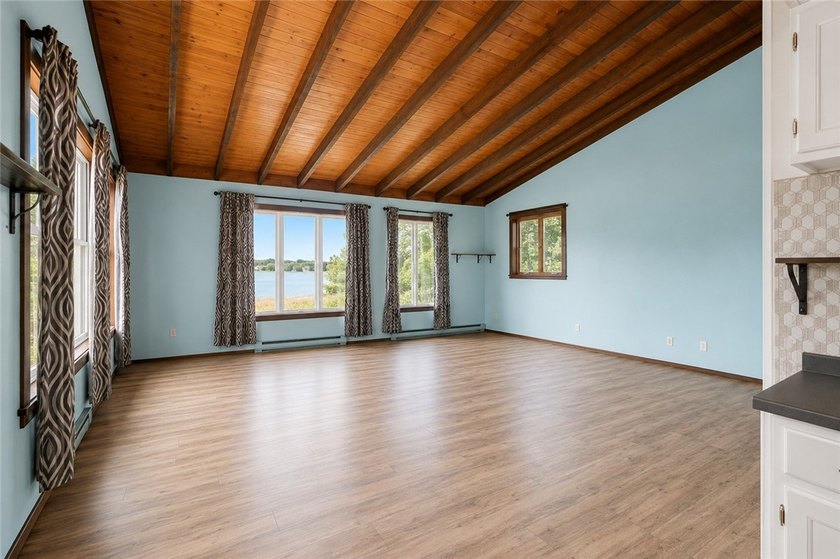 Discover the potential of this rare lakefront property offering - photo 3