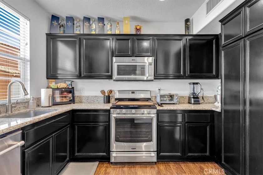 Welcome to 30 Marcilla, a beautifully upgraded home located in - photo 3
