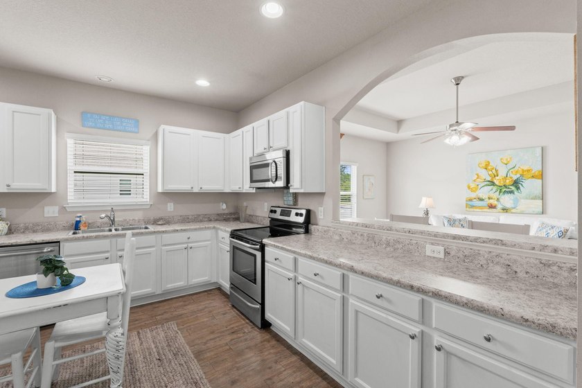 What a buy! Affordably priced to sell. This home has so much to - photo 12