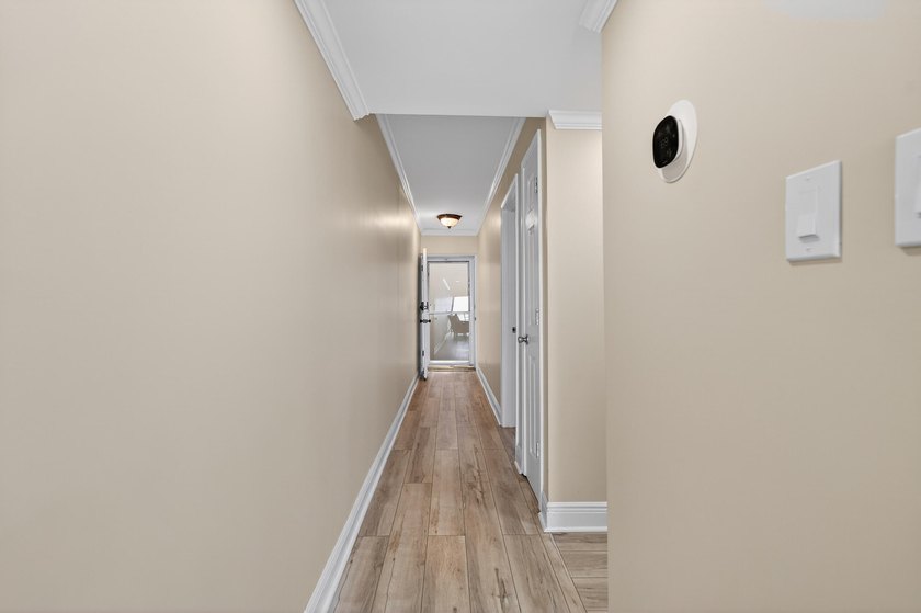 Rare opportunity to own a 3rd-floor end unit in the gated - photo 17