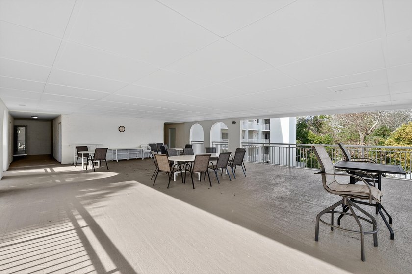 Rare opportunity to own a 3rd-floor end unit in the gated - photo 29
