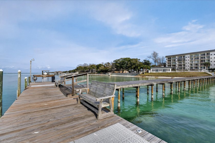 Rare opportunity to own a 3rd-floor end unit in the gated - photo 39