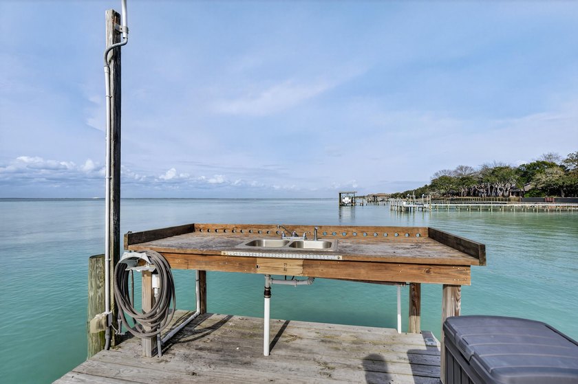 Rare opportunity to own a 3rd-floor end unit in the gated - photo 40