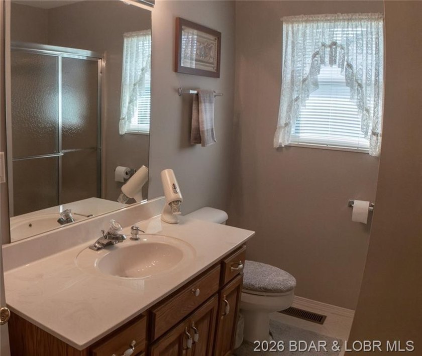Lakefront living at its finest in this stunning waterfront ranch - photo 31