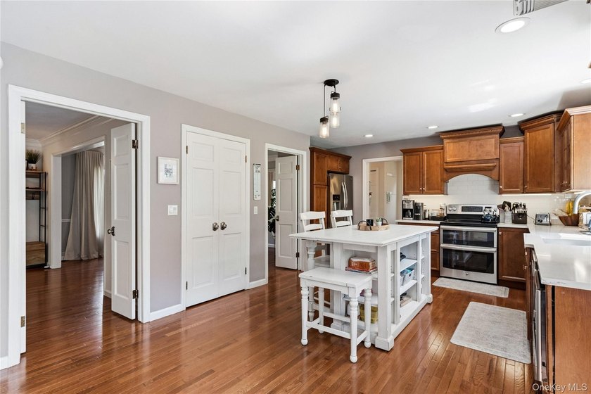 Nestled on a secluded, lushly landscaped three-quarter-acre - photo 15