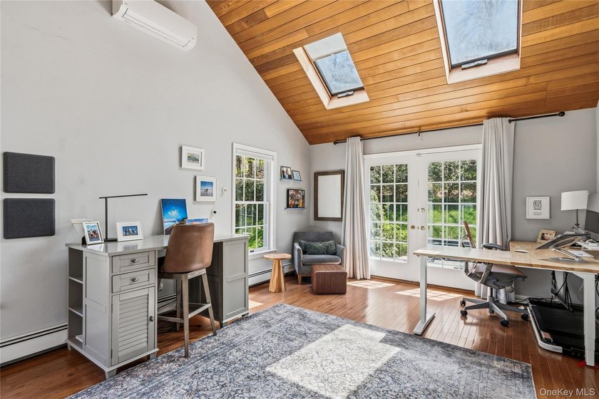 Nestled on a secluded, lushly landscaped three-quarter-acre - photo 20
