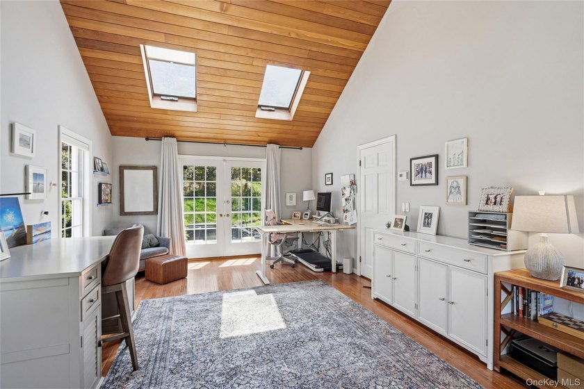 Nestled on a secluded, lushly landscaped three-quarter-acre - photo 21