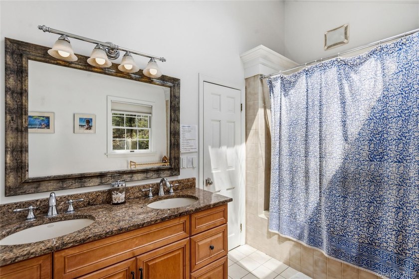 Nestled on a secluded, lushly landscaped three-quarter-acre - photo 29
