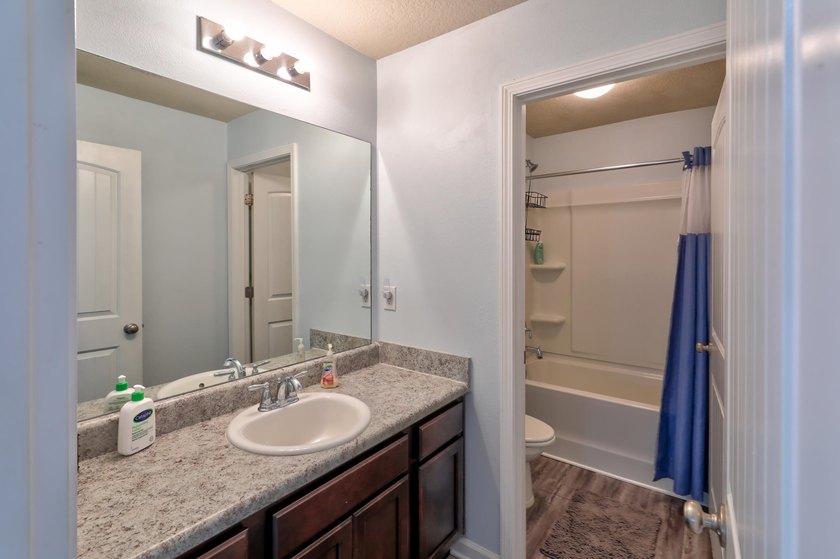 Welcome to this beautiful 4-bedroom, 3-bath home located in the - photo 31