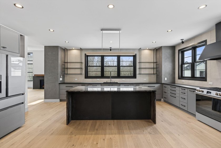 Recently completed and move in ready new construction in one of - photo 4