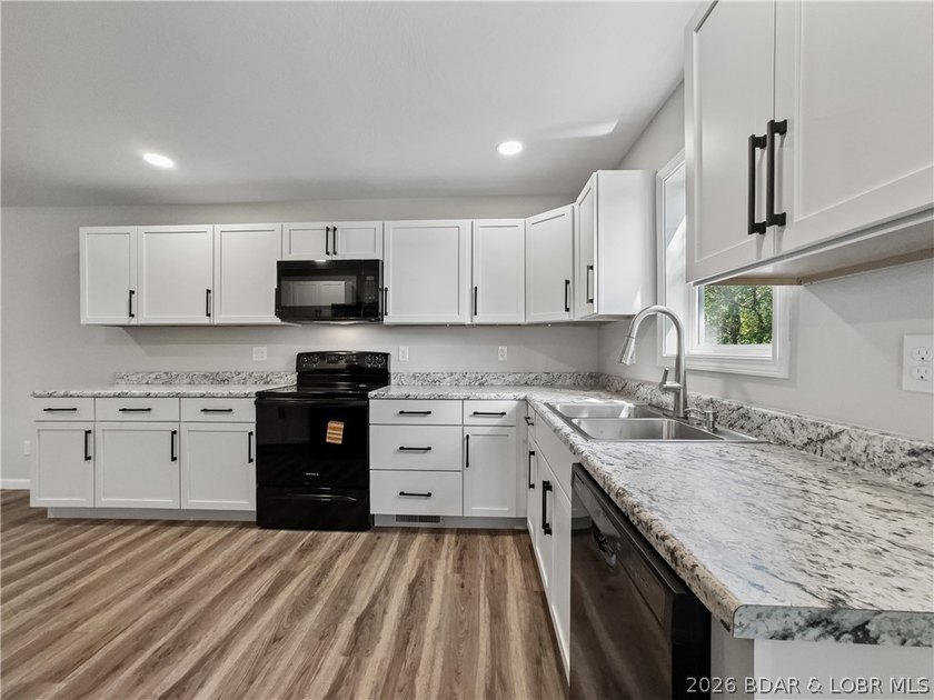 Completely rebuilt from the ground up, 5-bed, 3-bath home in - photo 11
