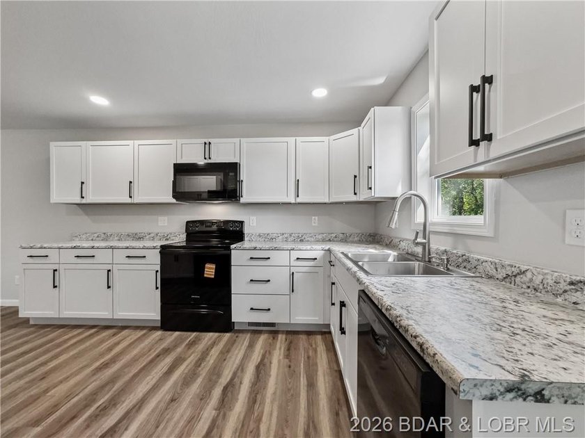 Completely rebuilt from the ground up, 5-bed, 3-bath home in - photo 11