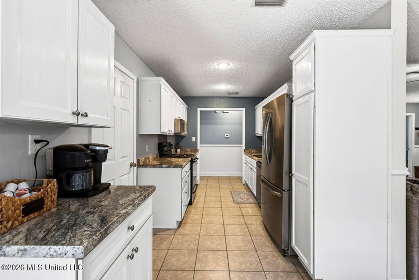 Welcome HOME! This well-maintained 3-bedroom, 2-bath home offers - photo 13