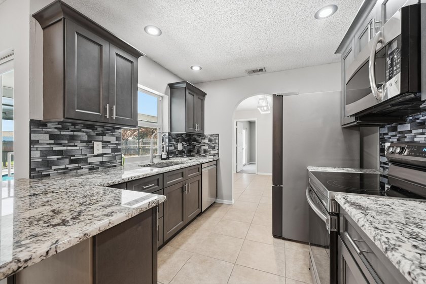 This CBS Pool Home has it All ! Centrally located with easy - photo 4
