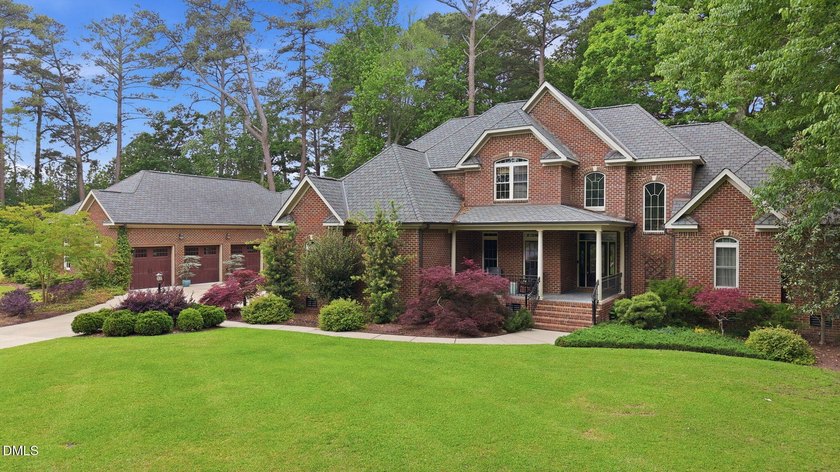 This custom-built Craftsman style home sits on 2 acres in - photo 2