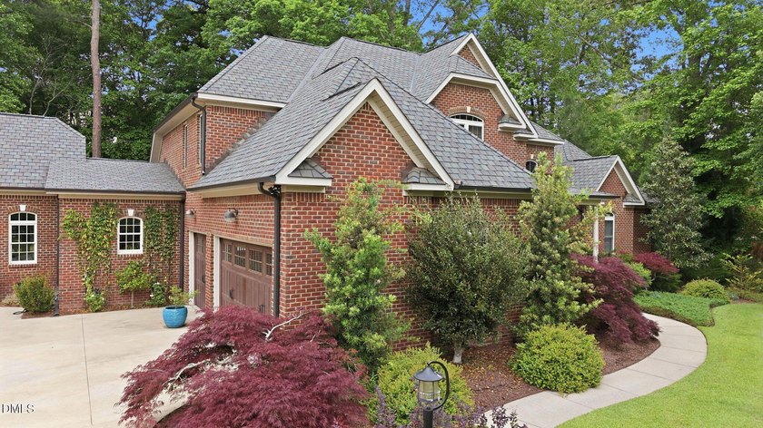 This custom-built Craftsman style home sits on 2 acres in - photo 3